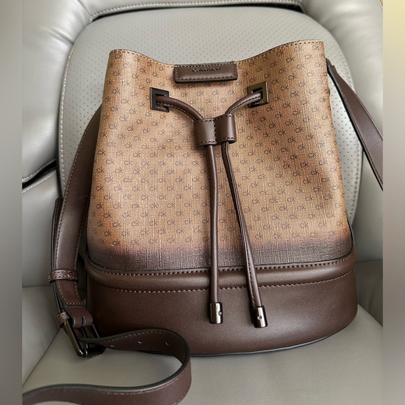 Calvin Klein Coated Canvas w/Leather Bucket CrossbodyBag, Brown/Tan Color - Picture 2 of 13